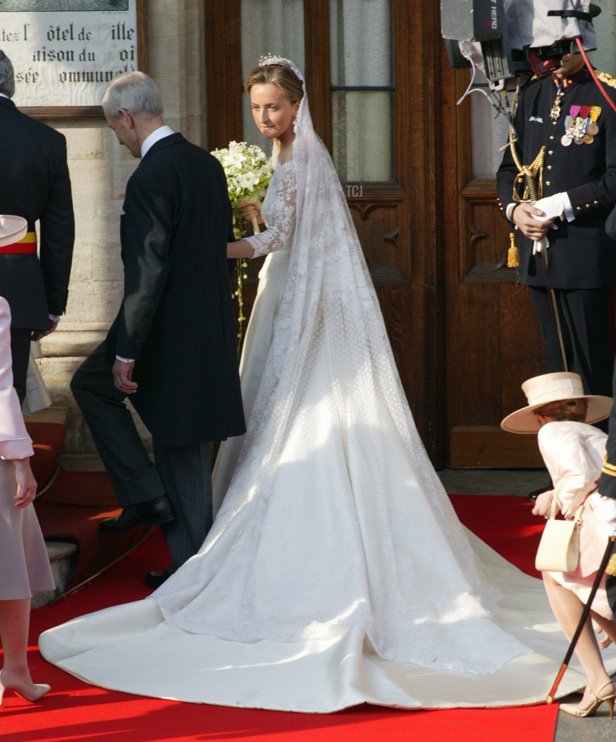 Nicolas Coombs and Princess Claire Coombs arrive at Brussels townhall April 12, 2003 in Brussels, Belgium. Prince Laurent of Belgium married Claire Coombs at a ceremony in Brussels townhall