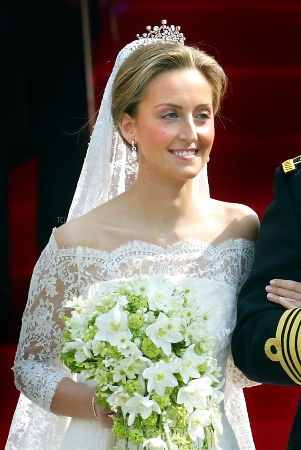 Prince Laurent of Belgium and his bride Claire Coombs leave the Cathedral of St. Michael and St. Gudula after their marriage ceremony April 12, 2003 in Brussels, Belgium