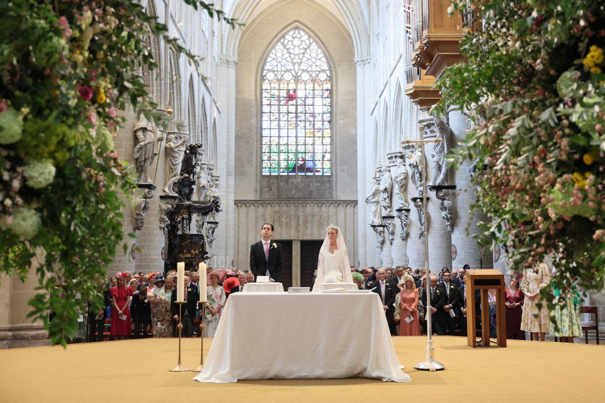 Princess Maria-Laura of Belgium and William Isvy stand during their wedding ceremony at Saint Michael and Saint Gudula Cathedral in Brussels on September 10, 2022