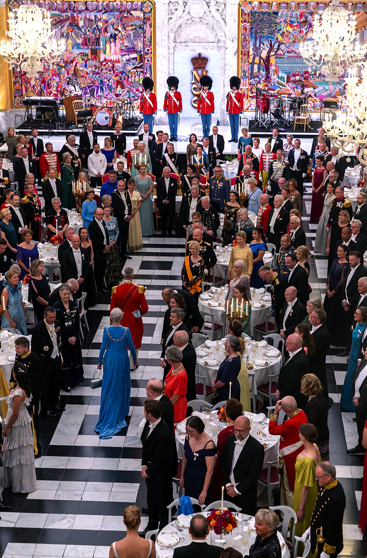 Queen Margrethe of Denmark is seen walking through the crowd at The Great Hall at Christiansburg Castle where she hosted a Gala Dinner on the occasion of the 50 years anniversary of Her Queens accession to the throne on September 11, 2022 in Copenhagen, Denmark