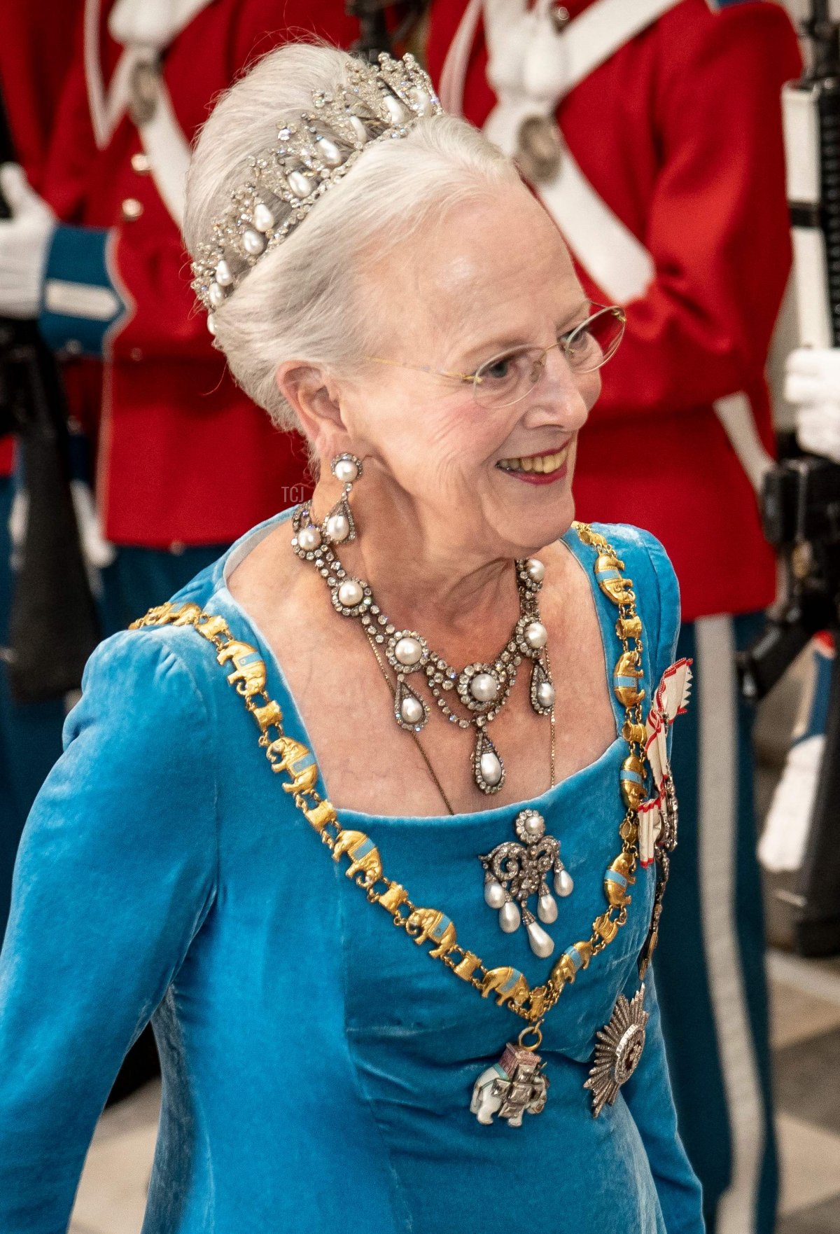 Queen Margrethe of Denmark reviews an honour guard as she arrives to the gala banquet at Christiansborg Palace on September 11, 2022, during celebrations to mark the 50th anniversary of her accession to the throne