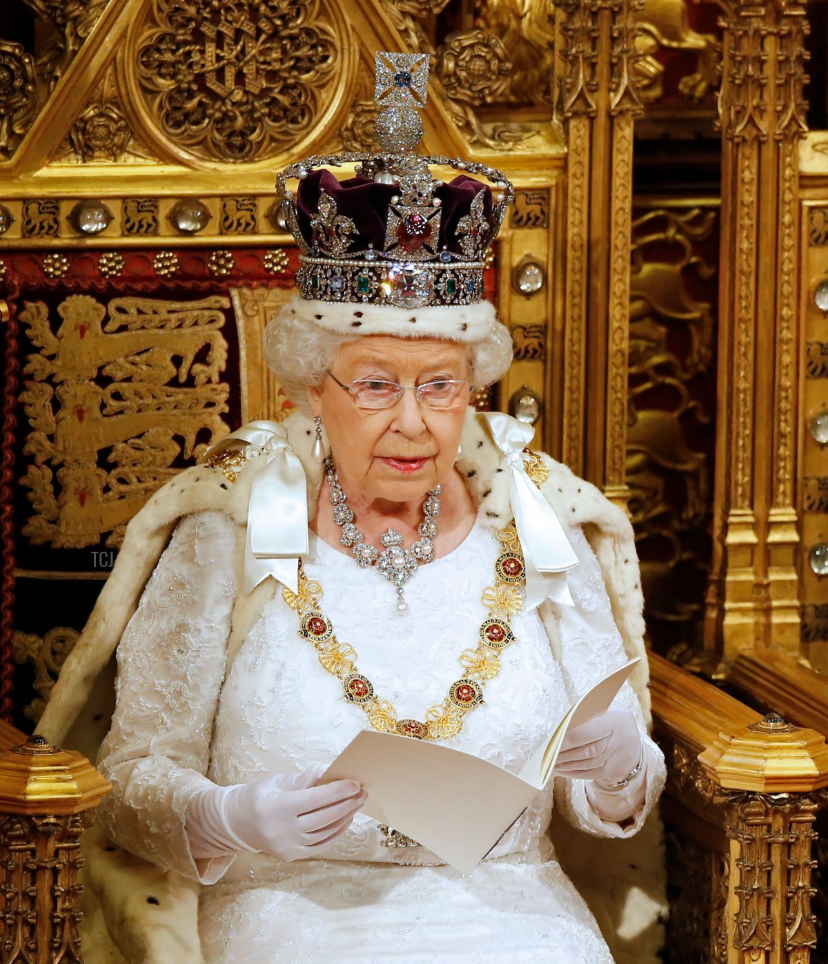 Britain's Queen Elizabeth II delivers the Queen's Speech during the State Opening of Parliament in central London, on May 18, 2016