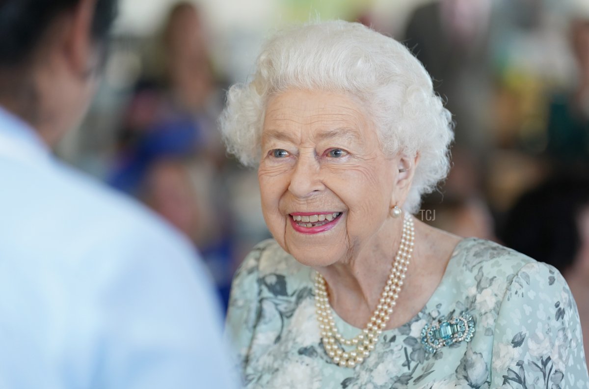 Queen Elizabeth II smiles during a visit to officially open the new building at Thames Hospice on July 15, 2022 in Maidenhead, England