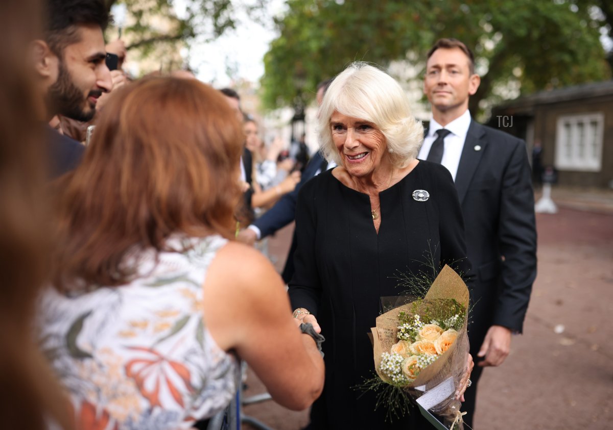 Camilla, Queen Consort greets members of the crowd along the Mall during a impromptu walkabout following the death of Queen Elizabeth II on September 10, 2022 in London, United Kingdom