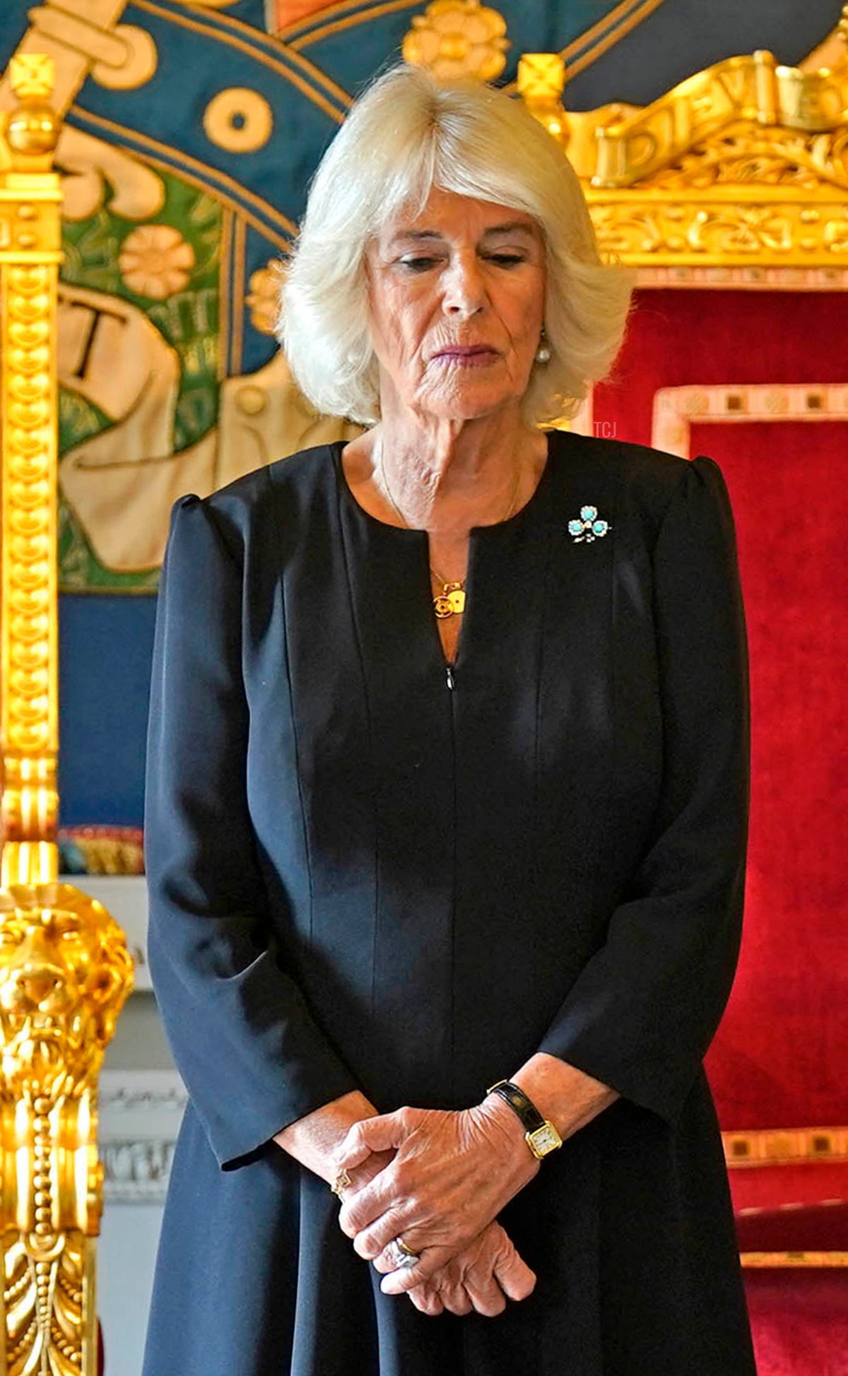 Britain's King Charles III, flanked by Britain's Camilla, Queen Consort, makes a speech after receiving a message of condolence following the death of his mother Queen Elizabeth II, at Hillsborough Castle in Belfast on September 13, 2022, during his visit to Northern Ireland