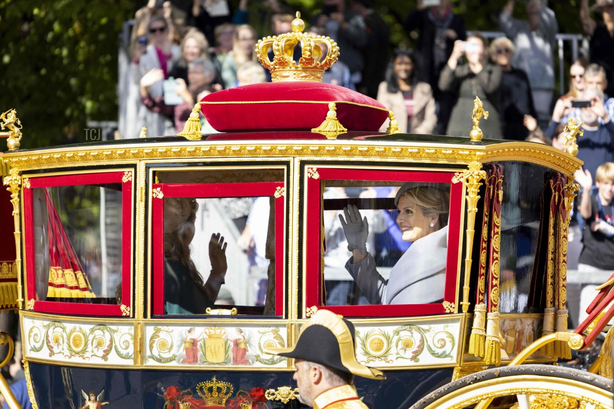 Queen Maxima waves from the Glass Carriage moving from the Lange Voorhout and the Noordeinde Palace in The Hague, on September 20, 2022