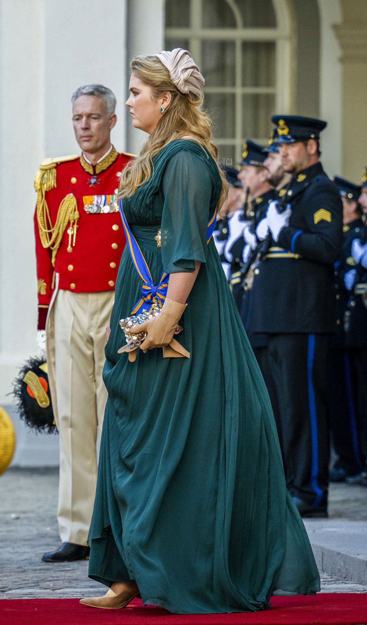 Netherlands' Crown Princess Catharina-Amalia (C) leaves the Noordeinde Palace to attend the Prince Day ceremony at the Royal Theater, known as Koninklijke Schouwburg, in The Hague on September 20, 2022, ahead of the official start of the parliamentary year