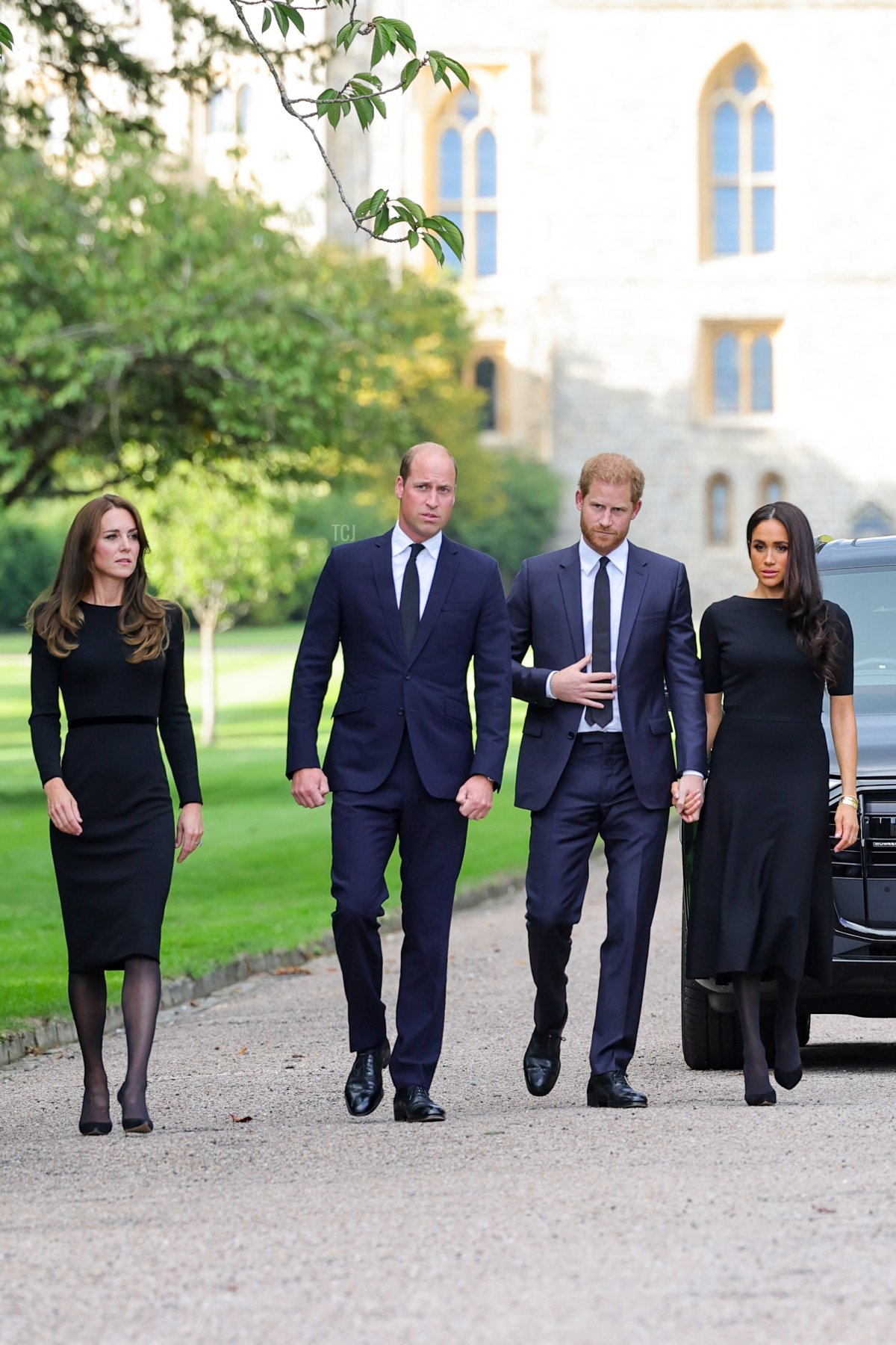 Catherine, Princess of Wales, Prince William, Prince of Wales, Prince Harry, Duke of Sussex, and Meghan, Duchess of Sussex on the long Walk at Windsor Castle on September 10, 2022 in Windsor, England