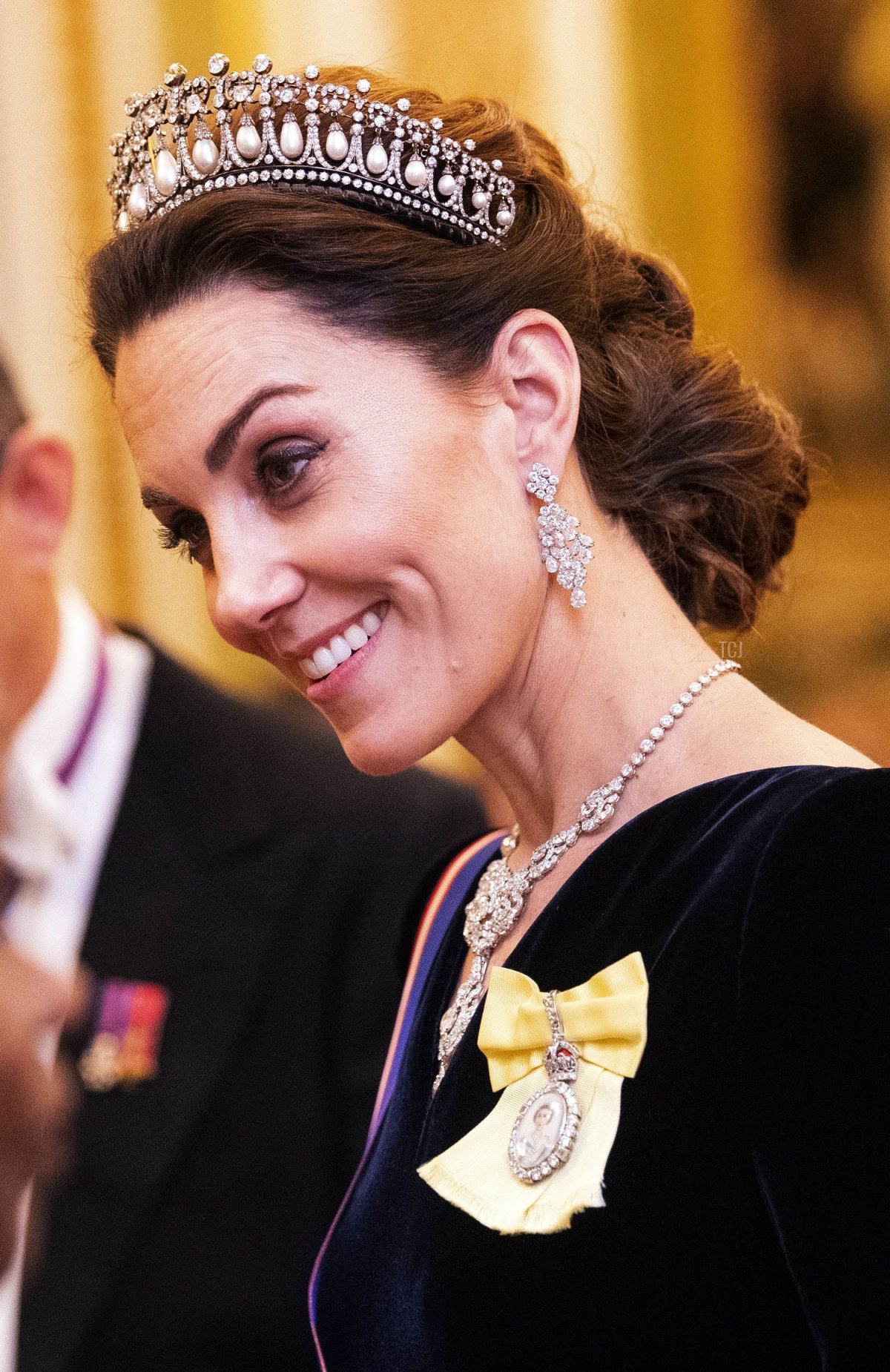 Catherine, Duchess of Cambridge talks to guests at an evening reception for members of the Diplomatic Corps at Buckingham Palace on December 11, 2019 in London, England