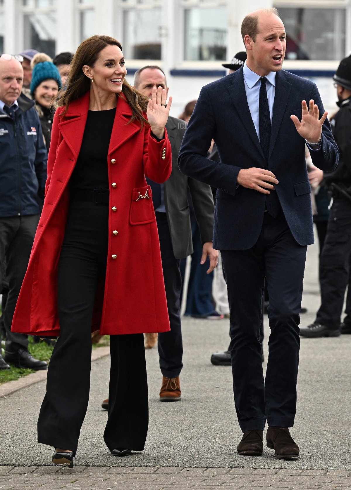 Britain's Prince William, Prince of Wales and his wife Britain's Catherine, Princess of Wales greet members of the public following a visit to the RNLI (Royal National Lifeboat Institution) Holyhead Lifeboat Station in Anglesey, north west Wales on September 27, 2022