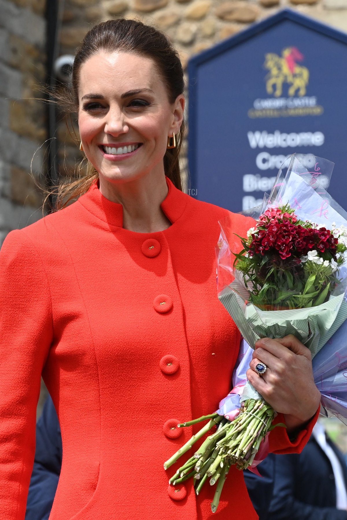 Britain's Catherine, Duchess of Cambridge, holds a bouquet of flowers as she leaves Cardiff Castle in Wales on June 4, 2022 as part of the royal family's tour for Queen Elizabeth II's platinum jubilee celebrations