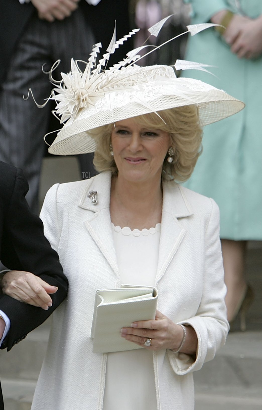 Prince Charles, the Prince of Wales, and his wife Camilla, the Duchess of Cornwall, depart the Civil Ceremony where they were legally married, at The Guildhall, Windsor on April 9, 2005 in Berkshire, England