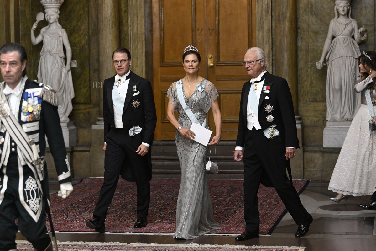 Prince Daniel, Crown Princess Victoria and King Carl Gustaf arrive at a dinner at Stockholm Palace September 29, 2022