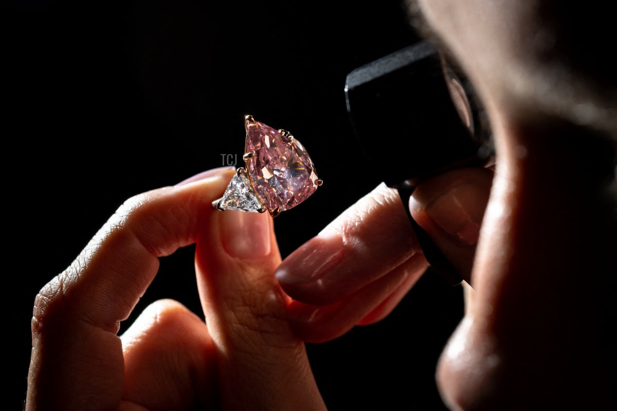 A picture taken in Geneva on September 23, 2022 shows the Fortune Pink, an exceptionally rare giant gemstone, that is expected to bring in up to $35 million when it will comes up for sale in Geneva on November 8, 2022 by Christie's auction house