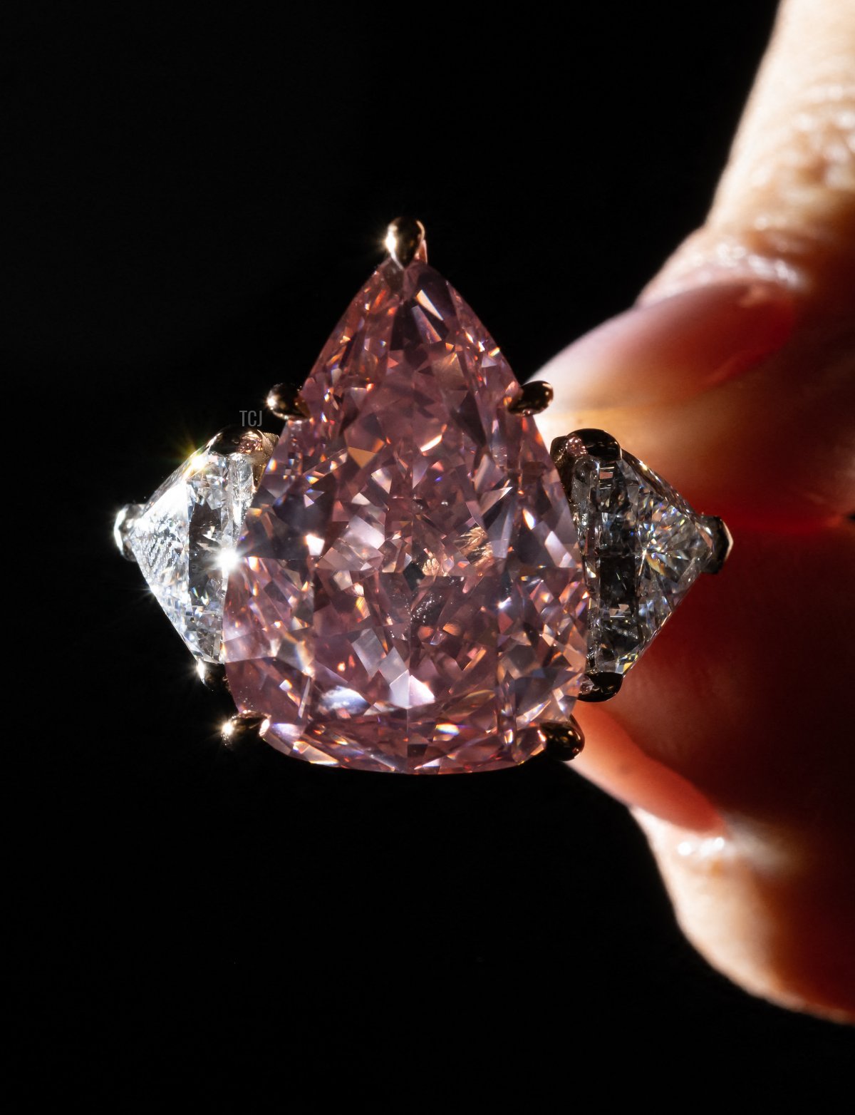 A picture taken in Geneva on September 23, 2022 shows the Fortune Pink, an exceptionally rare giant gemstone, that is expected to bring in up to $35 million when it will comes up for sale in Geneva on November 8, 2022 by Christie's auction house