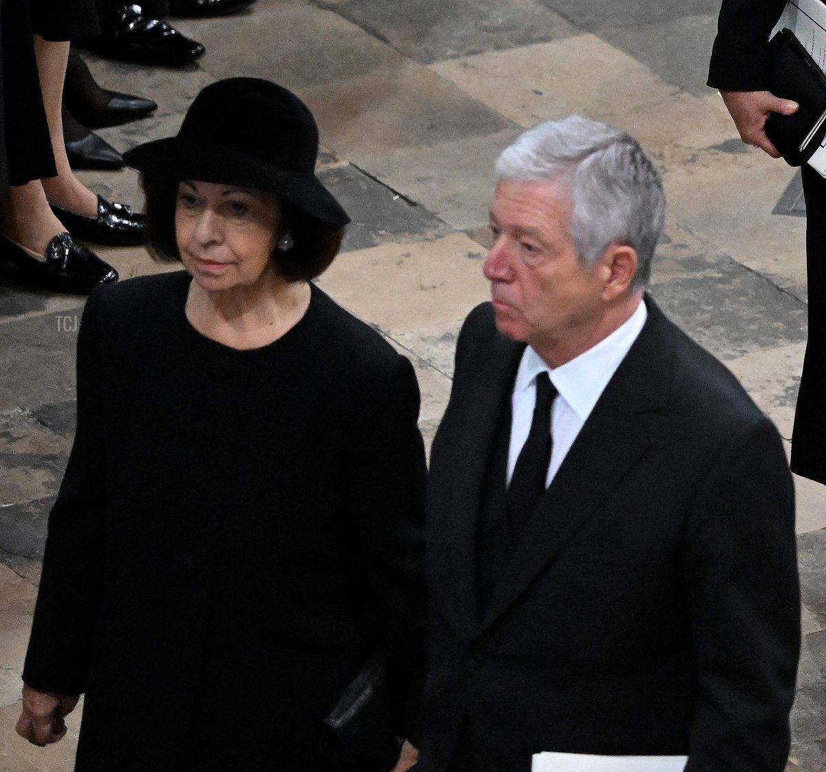 Grand Duchess, Maria Teresa (L) and Grand Duke, Henri of Luxembourg depart Westminster Abbey during the State Funeral of Queen Elizabeth II on September 19, 2022 in London, England