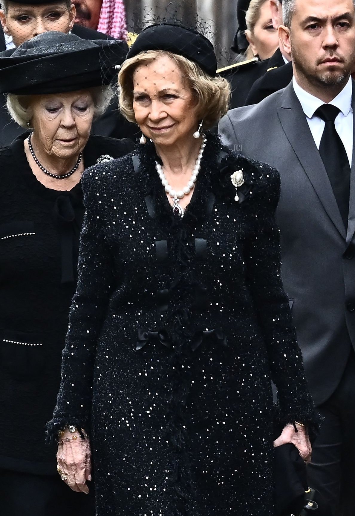 Spain's former King Juan Carlos I (C, 2ndR) and his wife Sofia arrive with Netherlands' Princess Beatrix (2ndL) at Westminster Abbey in London on September 19, 2022, for the State Funeral Service for Britain's Queen Elizabeth II