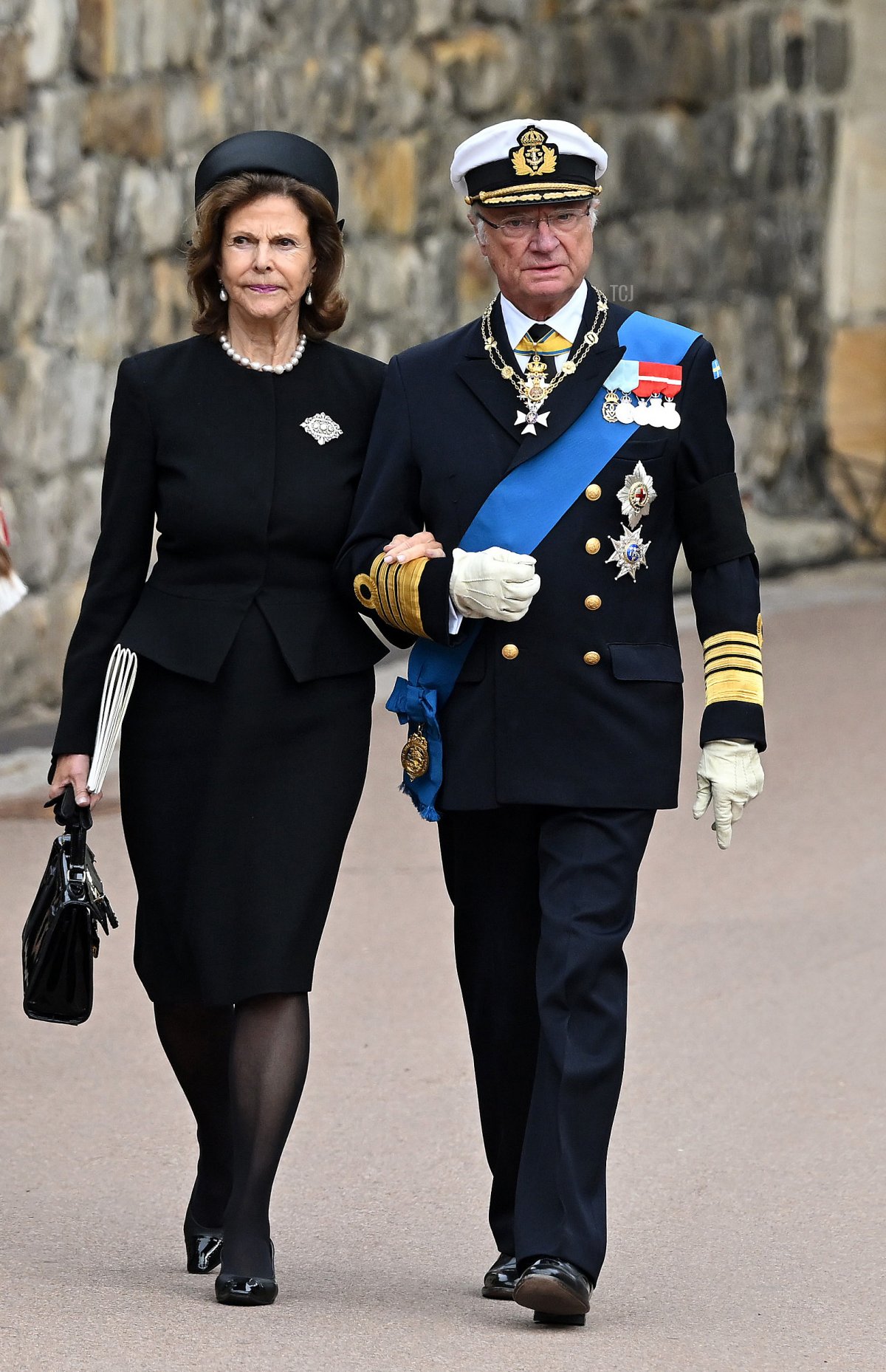 Queen Silvia of Sweden and Carl XVI Gustaf King of Sweden arrive at the Committal Service for Queen Elizabeth II at Windsor Castle on September 19, 2022 in Windsor, England