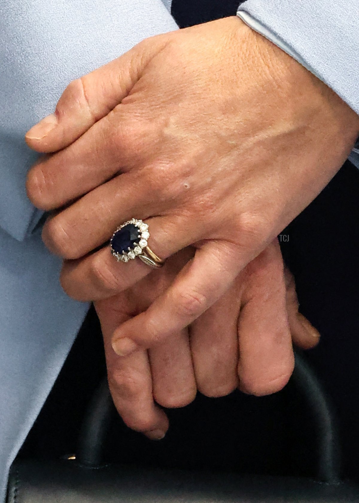 Britain's Catherine, Princess of Wales holds her handbag during a visit to PIPS Suicide Prevention (PIPS Charity), in Belfast, which works across communities in the city and throughout Northern Ireland to provide crisis support for those at risk of suicide and self-harm, as part of the royal visit to Northern Ireland, on October 6, 2022