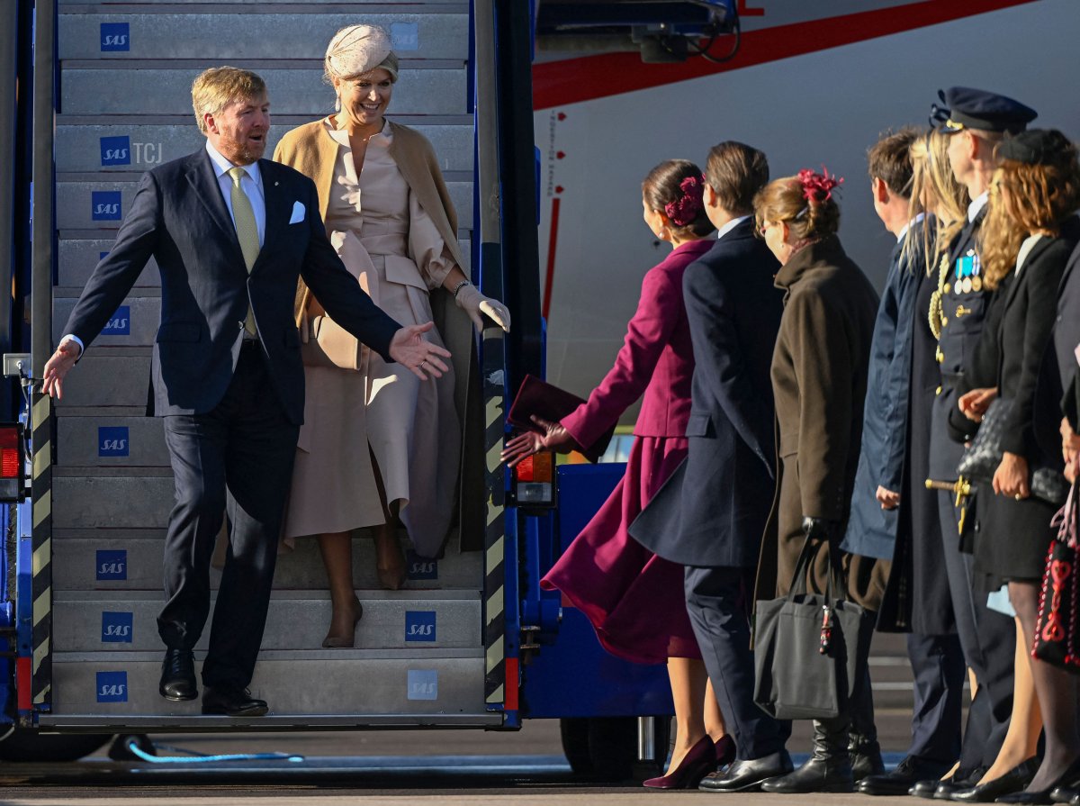 King Willem-Alexander of the Netherlands (L) and Queen Maxima of the Netherlands (2nd L) are welcomed by Crown Princess Victoria of Seden (3rd L) and Prince Daniel of Sweden (4th L) upon arrival at Arlanda airport in Stockholm, on October 11, 2022