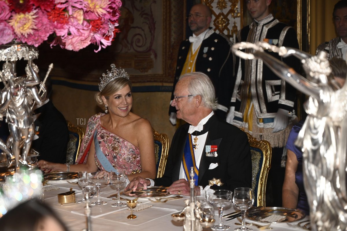 Queen Maxima and King Carl Gustaf during a gala dinner for the Dutch royal couple at the Royal Palace in Stockholm, Sweden October 11, 2022