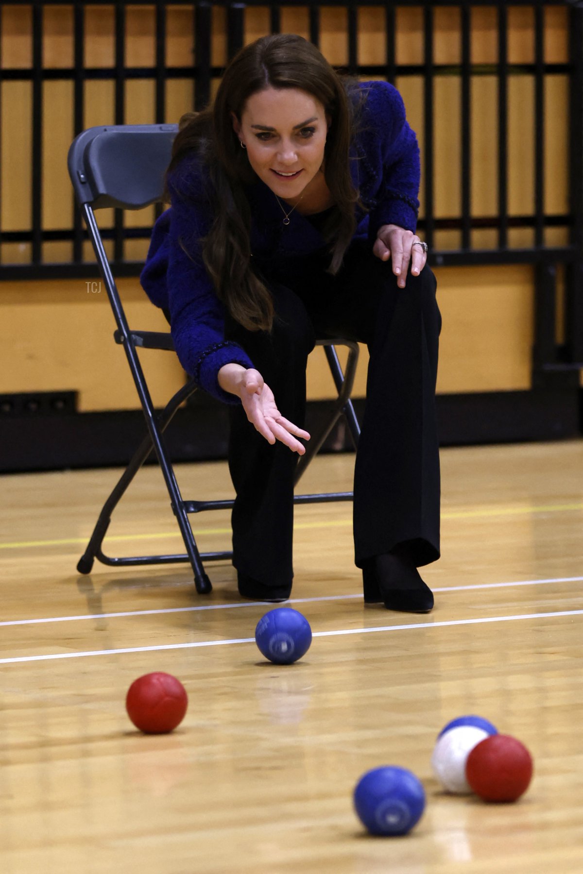 Britain's Catherine, Princess of Wales, plays indoor boccia during a visit to Copper Box Arena to celebrate the 10th anniversary of Coach Core in London on October 13, 2022