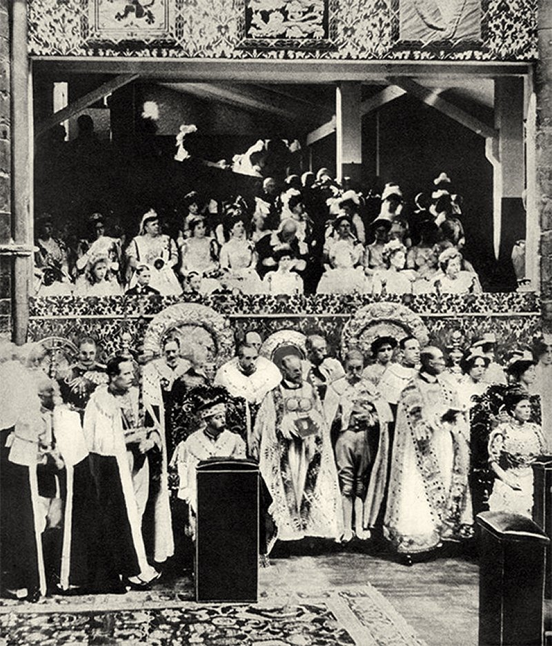 First photographs of a coronation ever taken. King George V and Queen Mary occupying their chairs of estate on the south side of the altar during that part of the coronation service which precedes the anointing