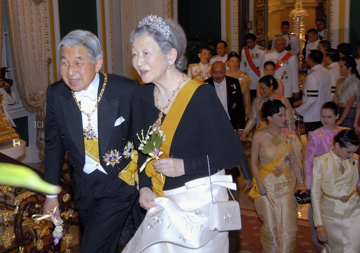 Emperor Akihito of Japan (L) and Empress Michiko of Japan attend the Royal banquet at the Golden Palace on June 13, 2006 in Bangkok