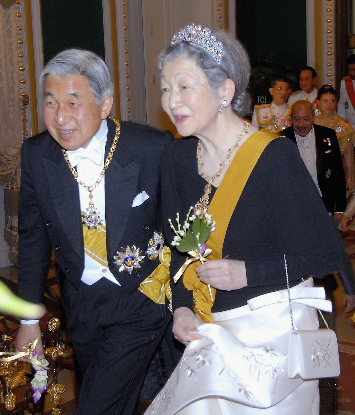Emperor Akihito of Japan (L) and Empress Michiko of Japan attend the Royal banquet at the Golden Palace on June 13, 2006 in Bangkok