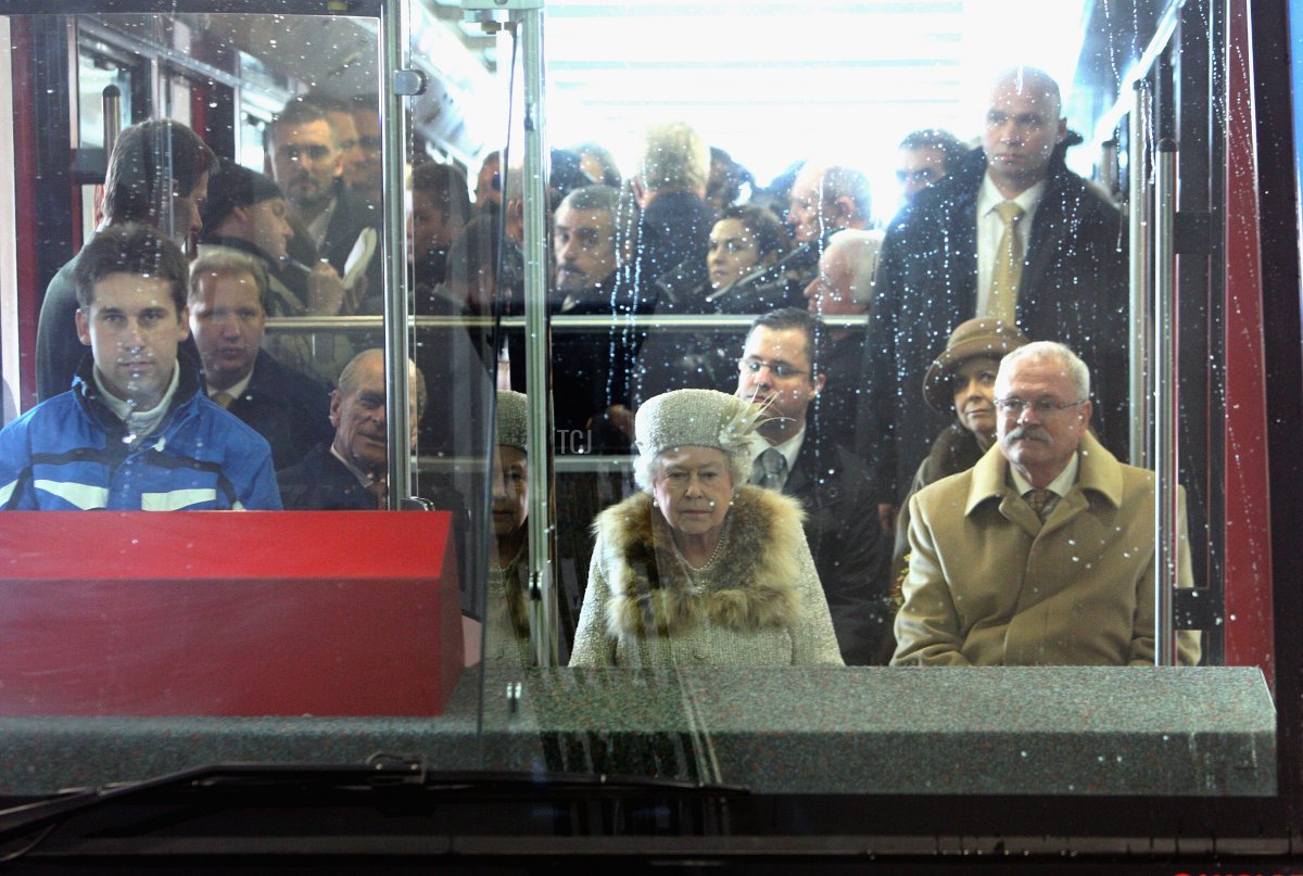 Queen Elizabeth II, Prince Philip, Duke of Edinburgh and President of Slovakia Ivan Gasparovic arrive at Hrebienok Ski Resort on a funicular railway, on the second day of a tour of Slovakia on October 24, 2008 in Bratislava, Slovakia
