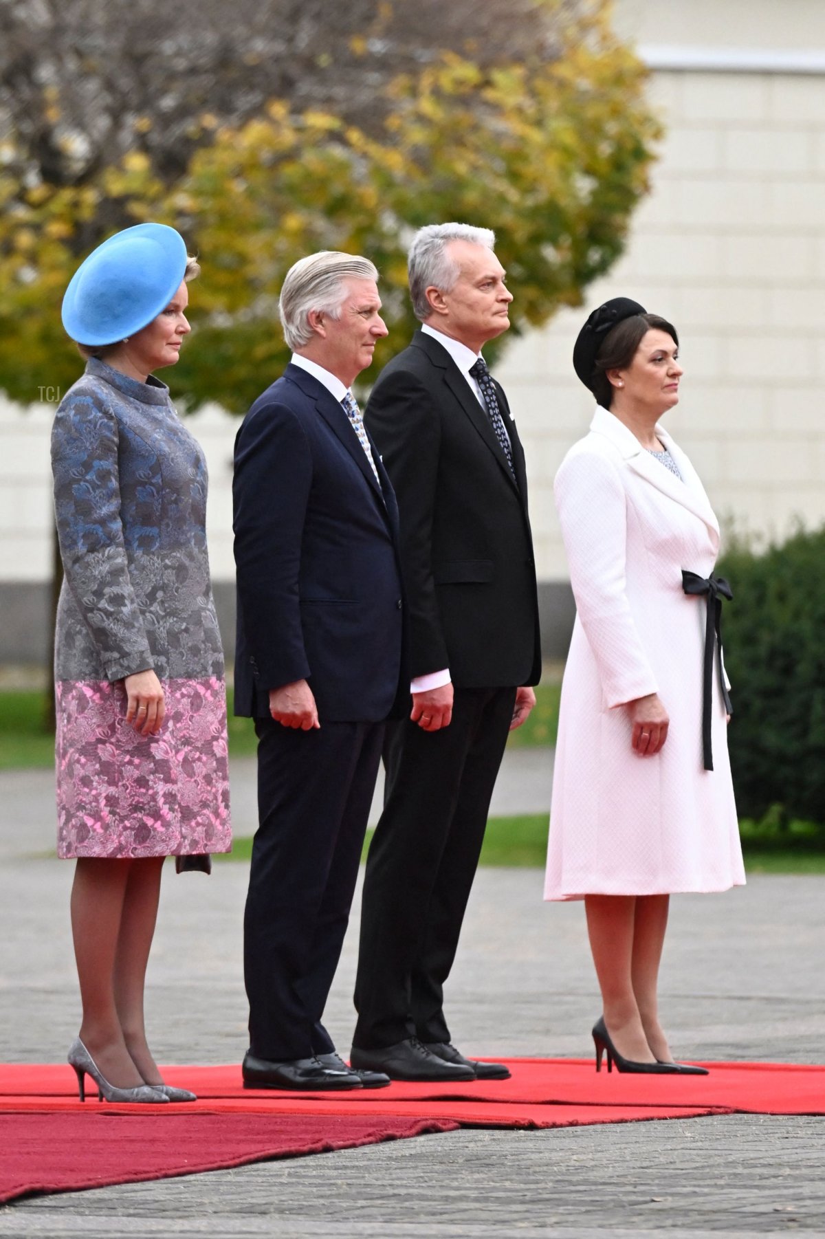 Queen Mathilde of Belgium, King Philippe - Filip of Belgium, Lithuania President Gitanas Nauseda and Diana Nausediene, wife of Lithuania President Gitanas Nauseda pictured during the official welcome at the presidential palace on the first day of the official state visit of the Belgian Royal Couple to the Republic of Lithuania, Monday 24 October 2022, in Vilnius