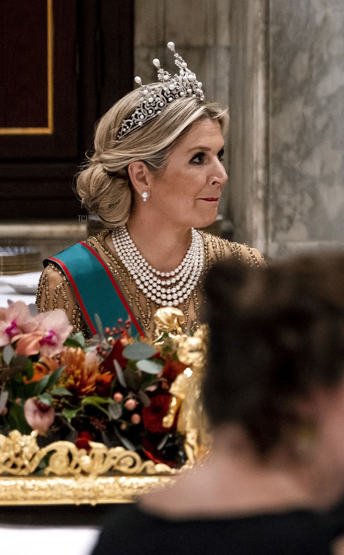 Queen Maxima (L) and King Willem-Alexander (R) listen to the speech of Italian President Sergio Mattarella during the state banquet in Amsterdam on November 9, 2022