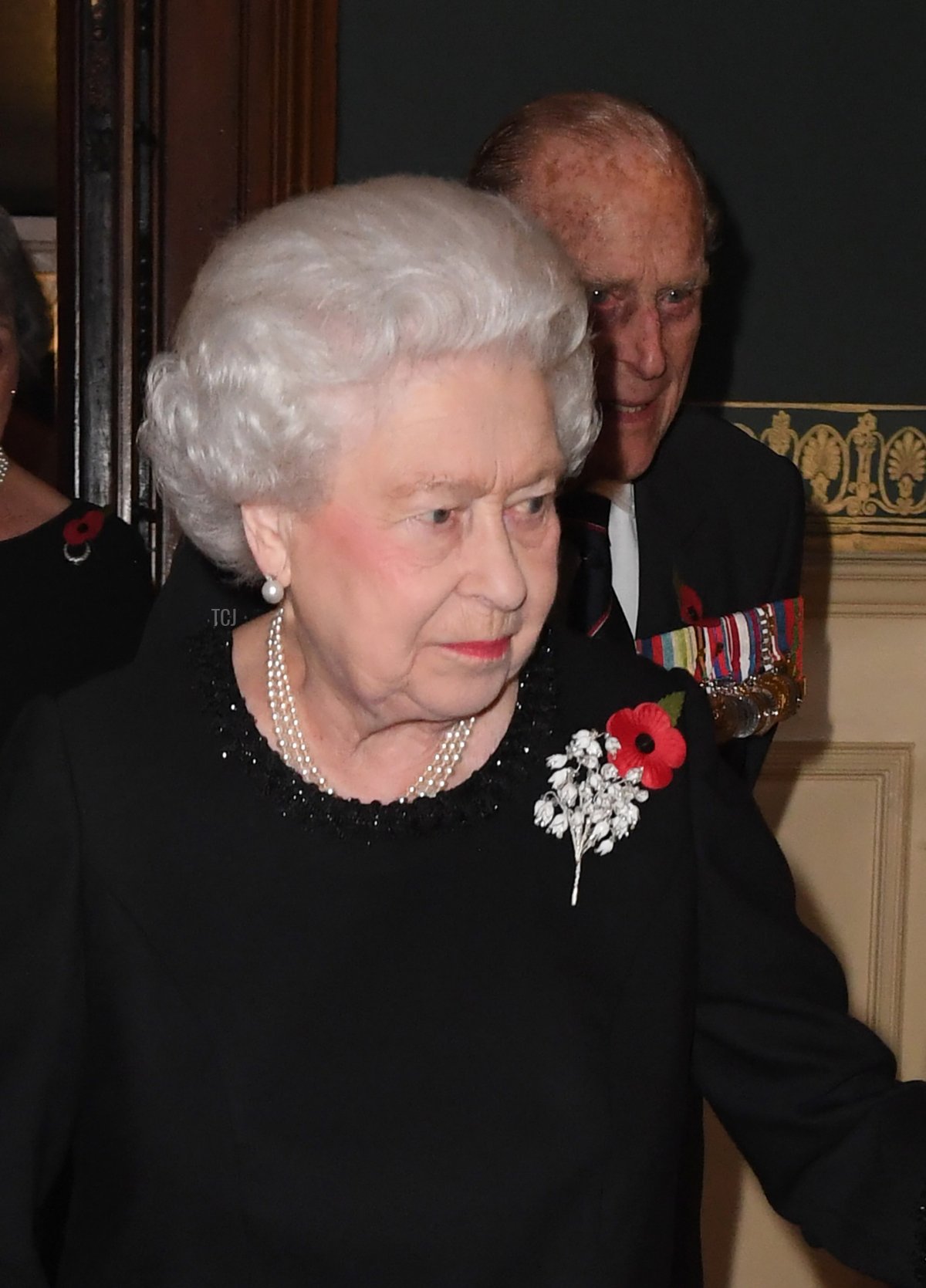 Britain's Queen Elizabeth II and the Britain's Prince Philip, Duke of Edinburgh (R) arrive at the Royal Albert Hall for the annual Royal Festival of Remembrance in central London on November 12, 2016