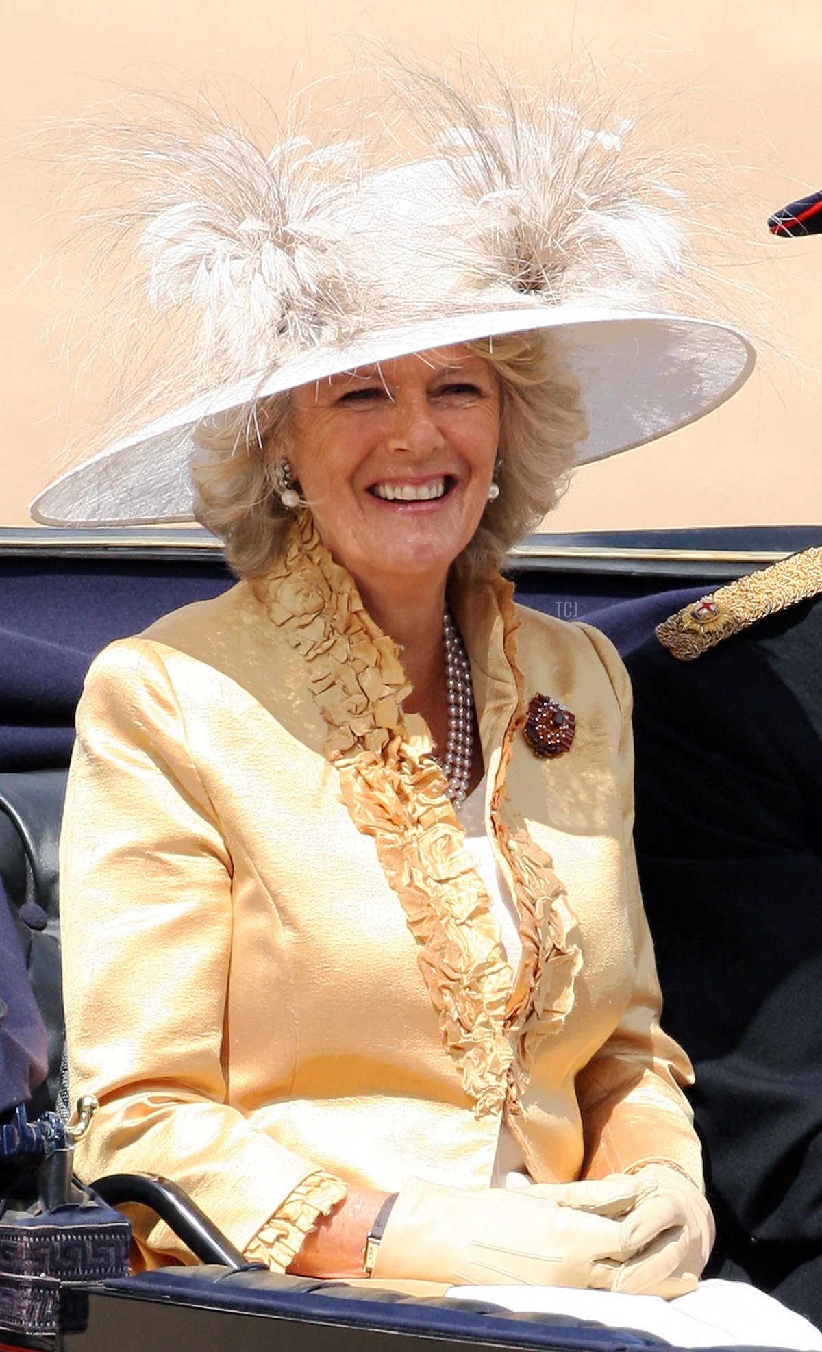 The Duchess of Cornwall sits alongside her step son Prince William in a carriage as they arrive for The Queen's Birthday Parade, "Trooping the Colour" at Horse Guards Parade in London, 16 June 2007