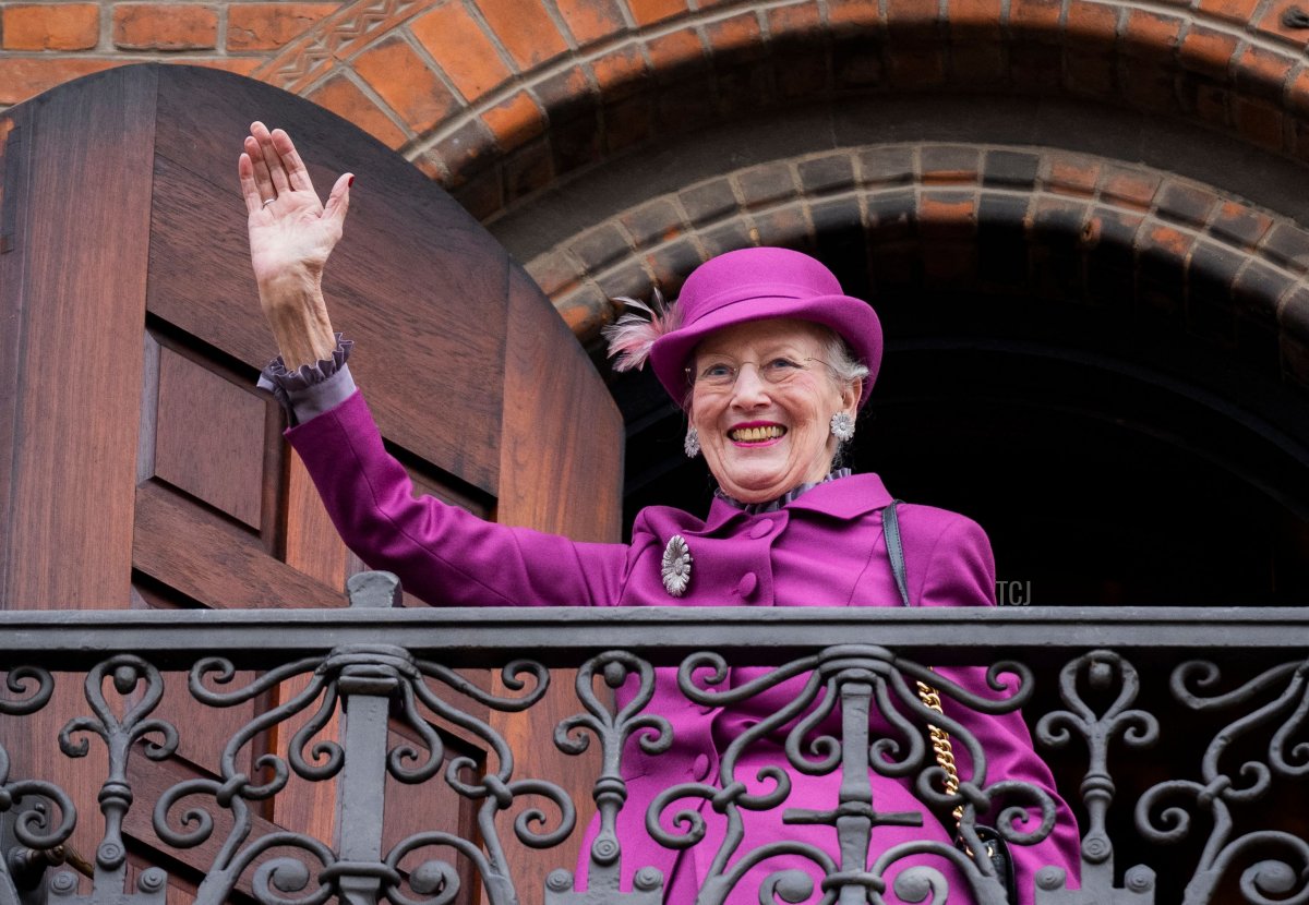 Denmark's Queen Margrethe II waves to onlookers from the balcony of Copenhagen City Hall prior to celebrations of the Queen's 50-year reign, in Copenhagen, Denmark, on November 12, 2022