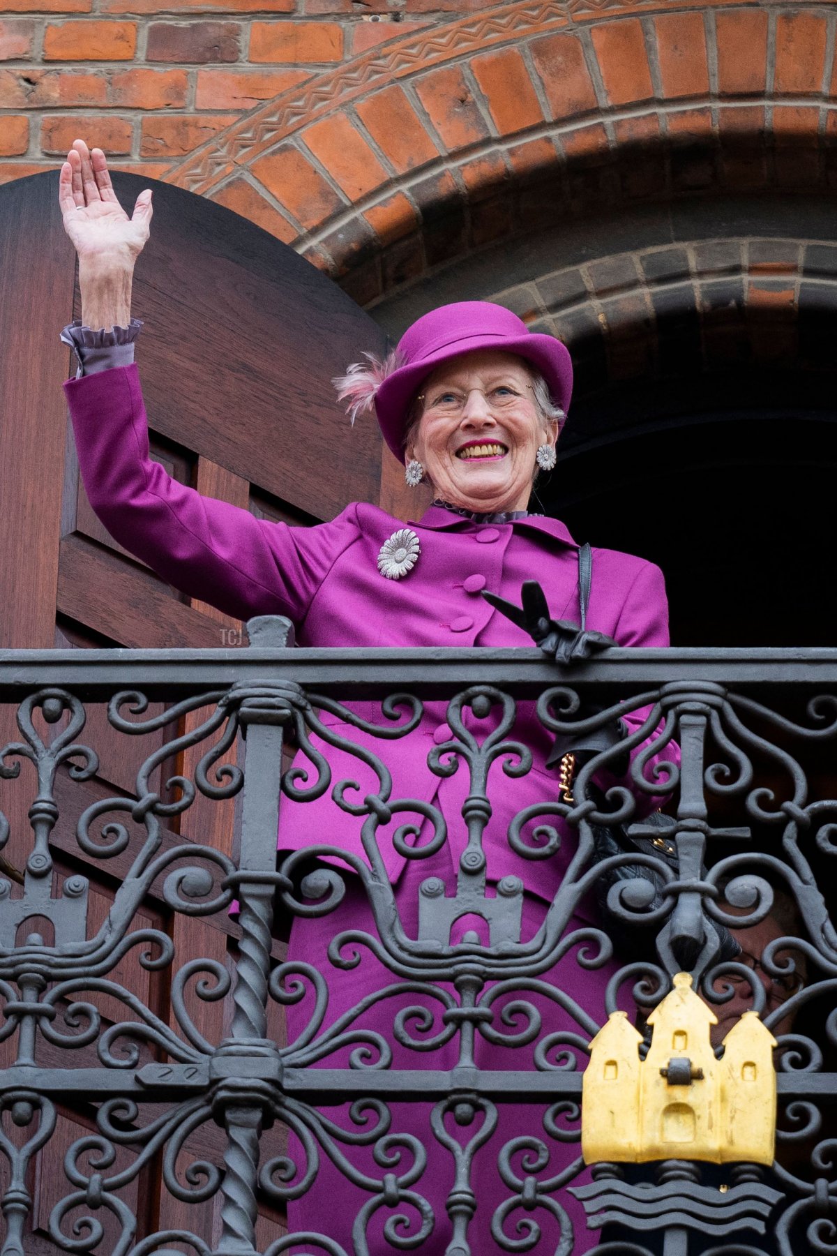 Denmark's Queen Margrethe II waves to onlookers from the balcony of Copenhagen City Hall prior to celebrations of the Queen's 50-year reign, in Copenhagen, Denmark, on November 12, 2022