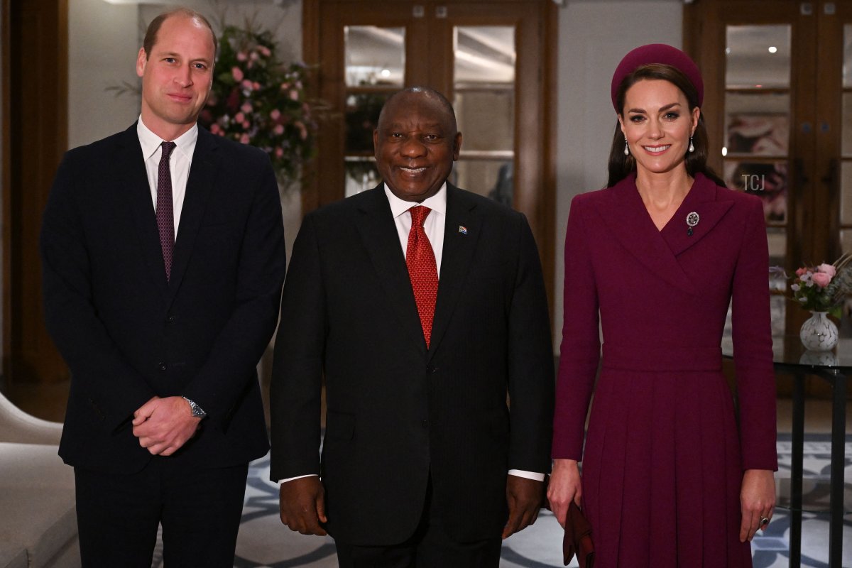 Britain's Prince William, Prince of Wales, (L) and his wife Britain's Catherine, Princess of Wales, pose with South Africa's President Cyril Ramaphosa (C) at the Corinthia Hotel in London on November 22, 2022, at the start of the president's two-day state visit
