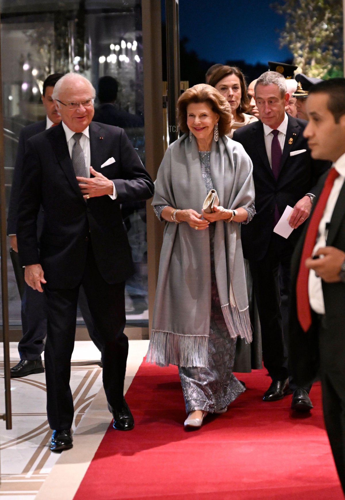 King Carl Gustaf, Queen Silvia of Sweden, the court's information manager Margareta Thorgren and first court marshal Mats Nilsson arrives at a reception hosted by the Swedish royal couple at the Seas Hotel to Ritz Carlton in Amman, Jordan, November 16, 2022