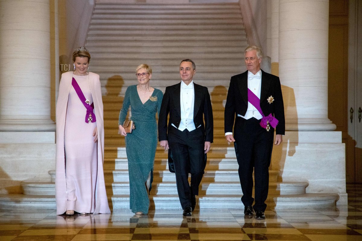 Queen Mathilde of Belgium (L), Switzerland's President Ignazio Cassis (C) and his wife Paola Rodoni Cassis (2nd-L) and King Philippe of Belgium (R) attend a state banquet during the state visit of the Switzerland's president in Brussels on November 24, 2022