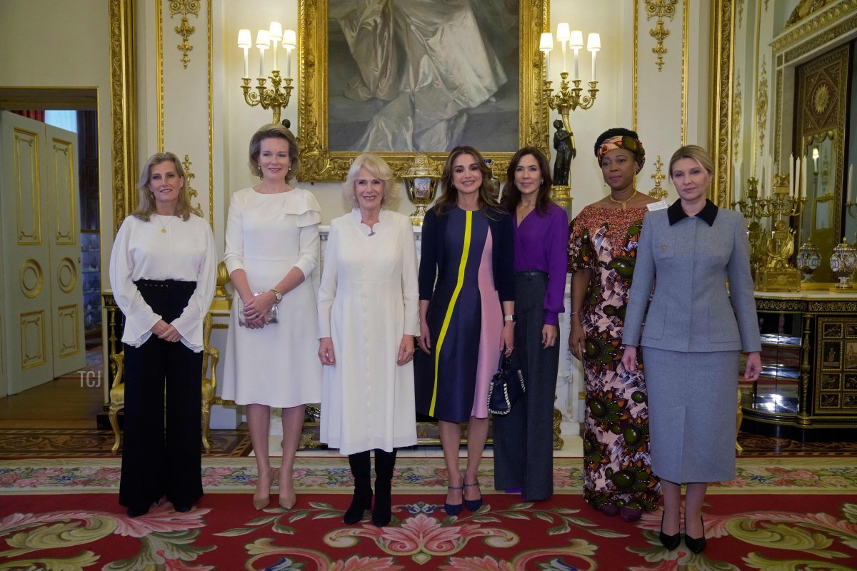Britain's Sophie, the Countess of Wessex, Queen Mathilde of Belgium, Britain's Queen Consort Camilla, Queen Rania of Jordan, Danish Crown Princess Mary, Sierra Leone's First Lady Fatima Maada Bio, Ukraine's First Lady Olena Zelenska pose during a reception to raise awareness of violence against women and girls as part of the UN 16 days of Activism against Gender-Based Violence, at Buckingham Palace in London on November 29, 2022