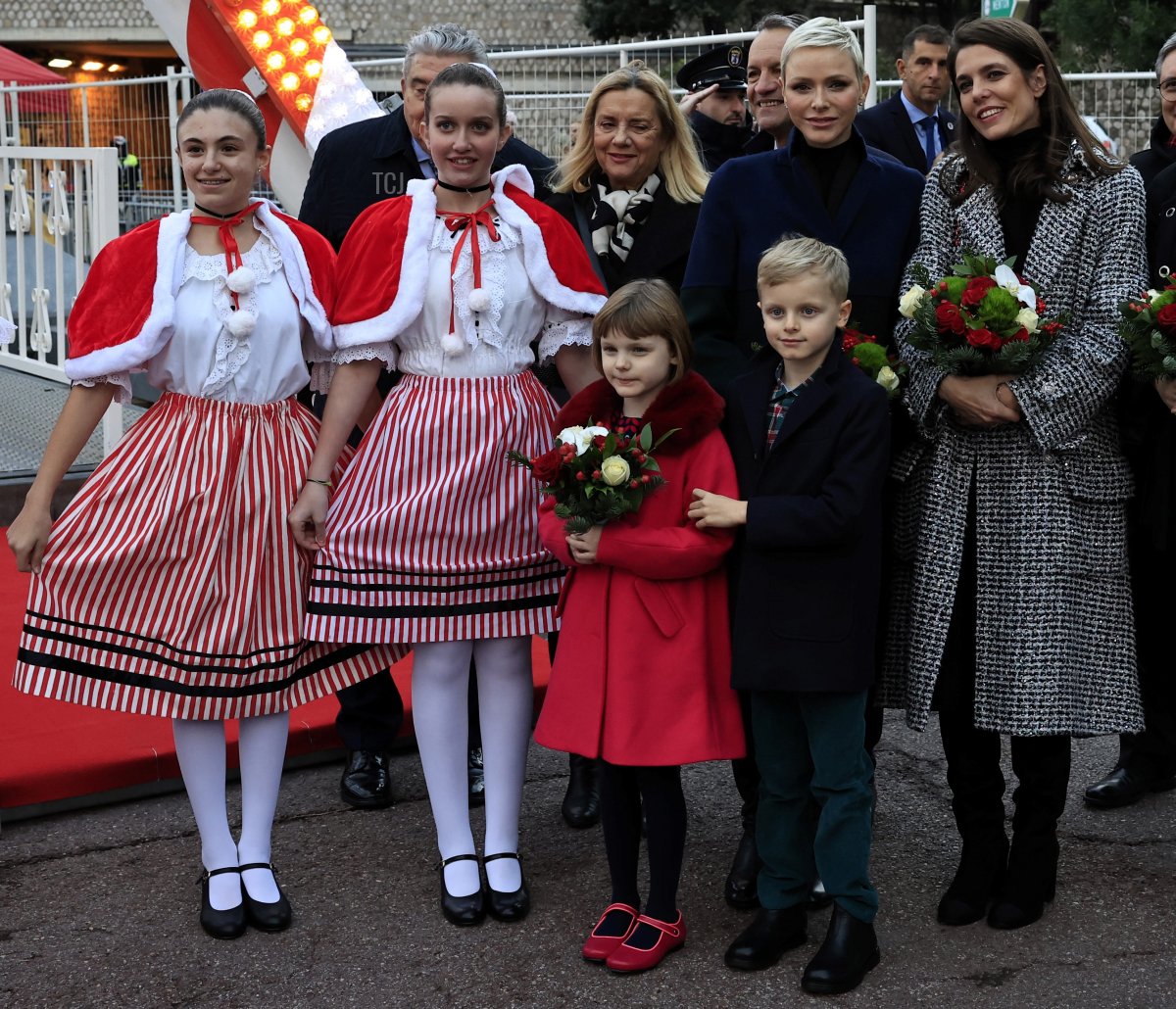 Princess Charlene of Monaco (up, 2ndR) Charlotte Casiraghi (R) Monaco's Prince Jacques (front R) and Princess Gabriella (C) inaugurate the Christmas village in Monaco, on December 2, 2022