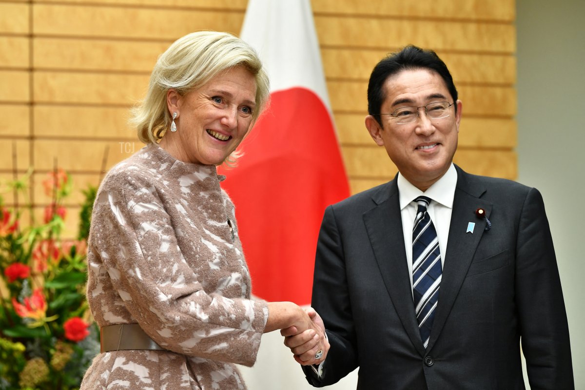 Japan's Prime Minister Fumio Kishida (R) welcomes Princess Astrid of Belgium (L) at the start of their meeting at the prime minister's official residence in Tokyo on December 5, 2022