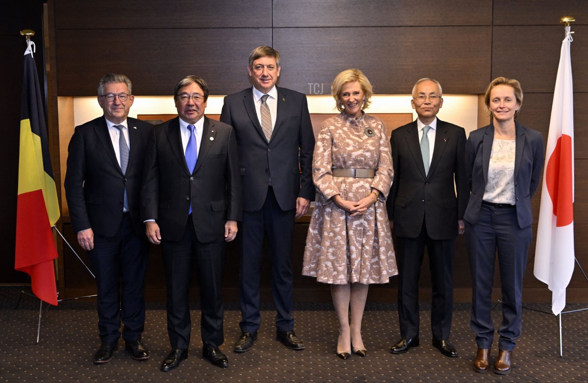 Mayor of Brugge Dirk De Fauw, NYK president Hitoshi Nagasawa, Flemish Minister President Jan Jambon, Princess Astrid of Belgium, NYK Chairman Tadaaki Naito and Antwerp harbor alderwoman Annick De Ridder pose after a meeting with Nippon Yusen Kaisha (NYK) during the Belgian Economic Mission to Japan, Monday 05 December 2022 in Tokyo