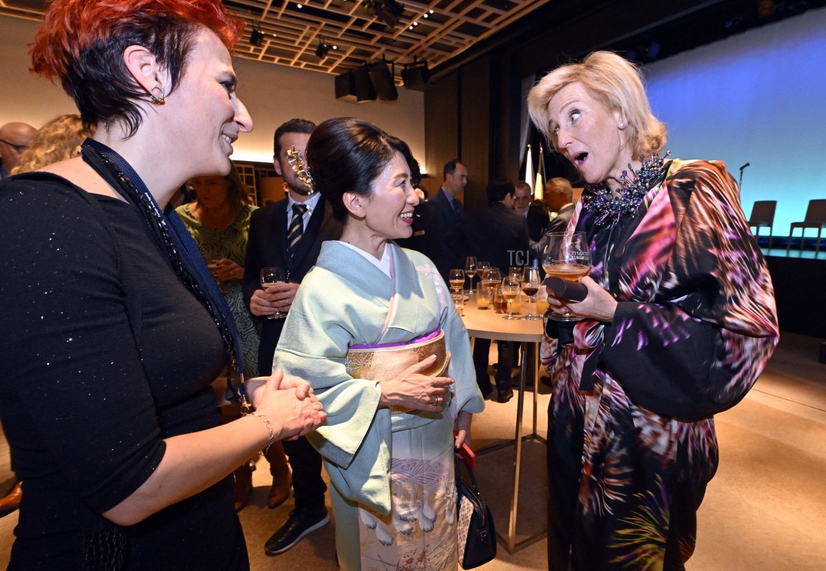 Princess Astrid of Belgium (R) meets invitees at the Belgian official reception during the Belgian Economic Mission to Japan, Monday 05 December 2022 in Tokyo