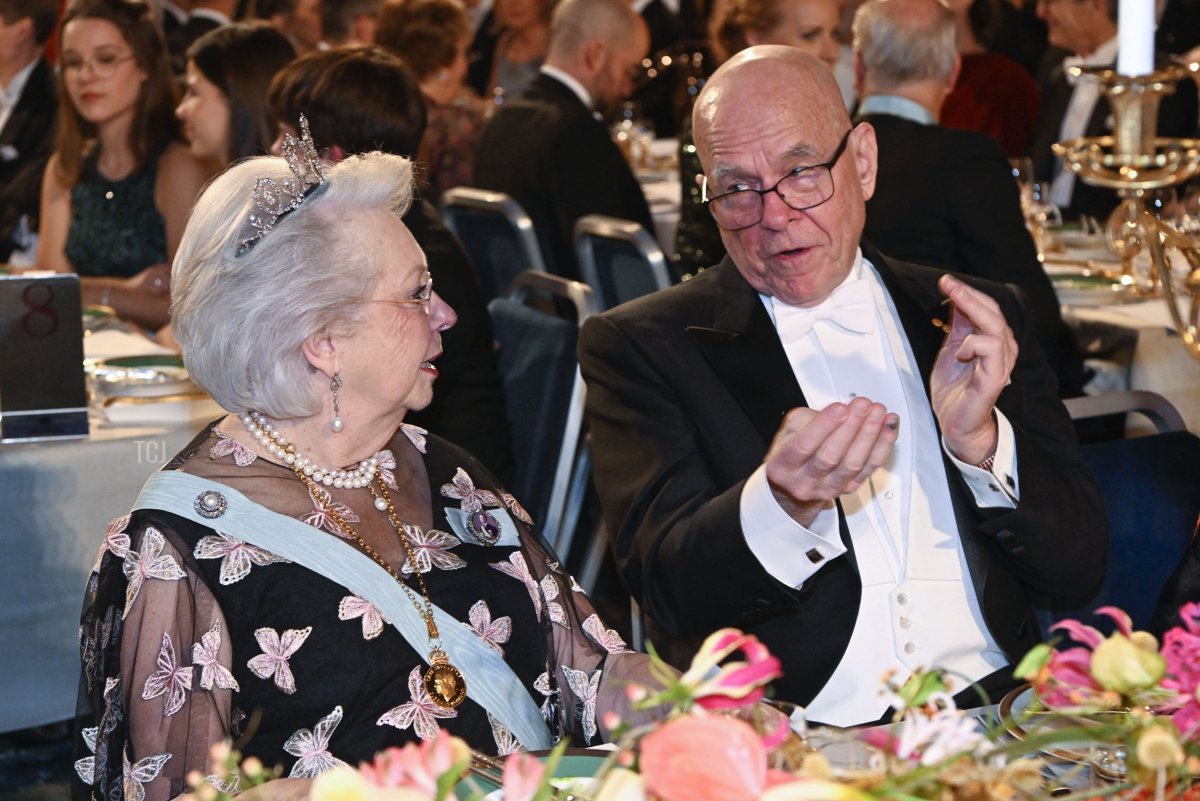 Princess Christina of Sweden and Nobel Prize in Chemistry 2022 laureate US chemist K. Barry Sharpless talk during a royal banquet to honour the laureates of the Nobel Prize 2019 following the Award ceremony on December 10, 2022