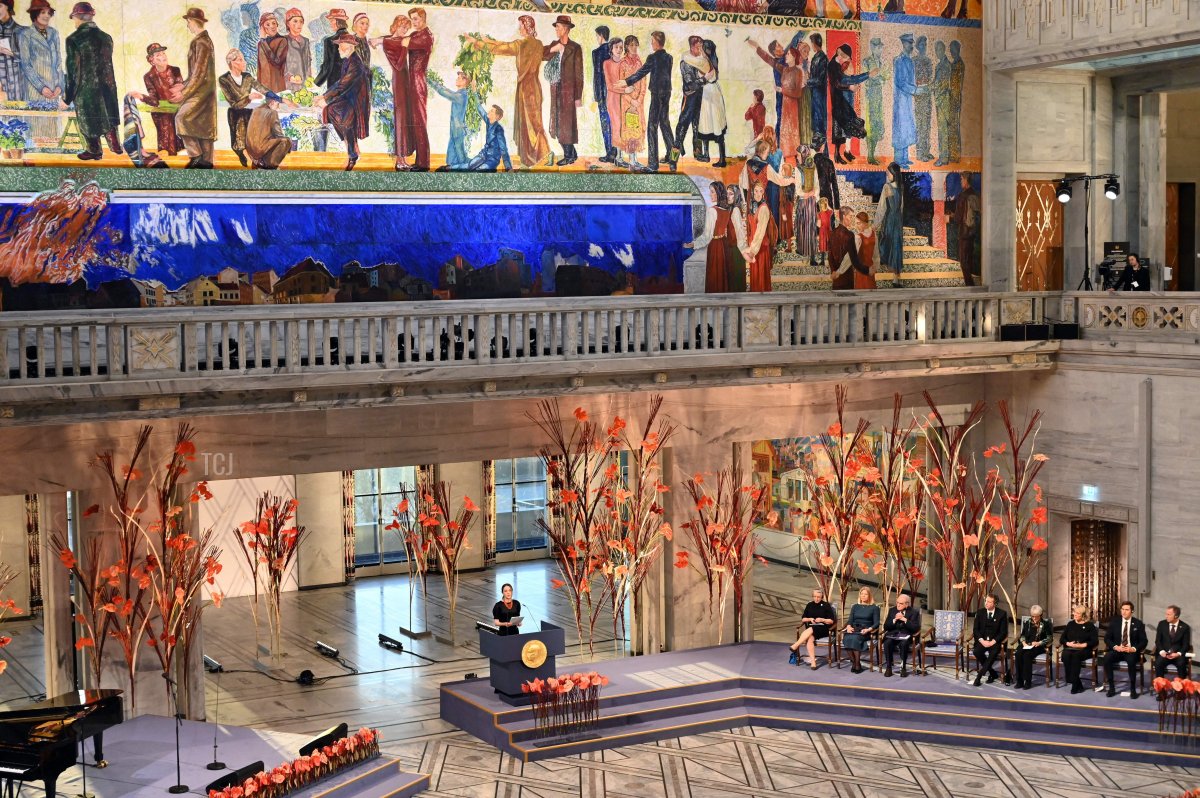 Nobel Peace Prize 2022 winner and Head of the Ukrainian Center for Civil Liberties (CCL) Oleksandra Matviichuk (L) delivers a speech during the 2022 Nobel Peace Prize award ceremony at the City Hall in Oslo, Norway, on December 10, 2022
