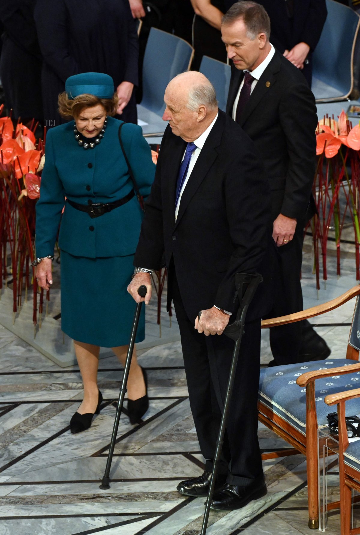 King Harald V of Norway, Queen Sonja of Norway, and Norwegian Nobel Committee chairwoman Berit Reiss-Andersen arrive to attend the 2022 Nobel Peace Prize award ceremony at the City Hall in Oslo, Norway, on December 10, 2022