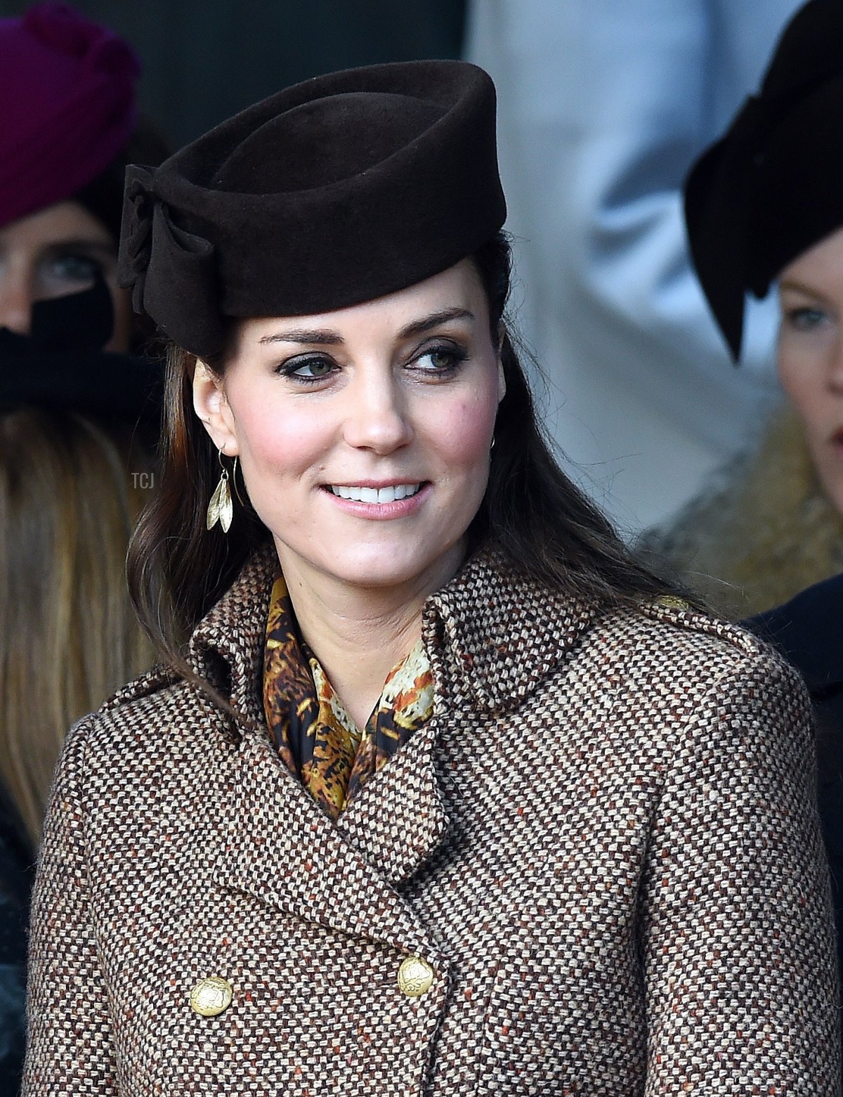 Britain's Catherine, Duchess of Cambridge, leaves after attending with other members of the royal family the traditional Christmas Day Church Service at Sandringham in eastern England, on December 25, 2014