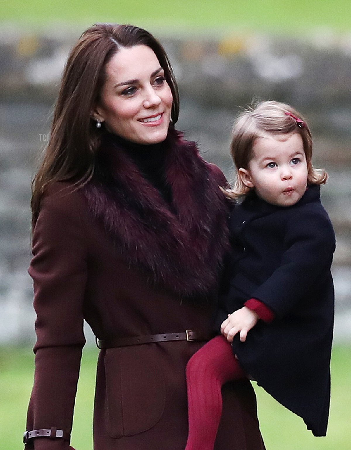 Catherine, Duchess of Cambridge and Princess Charlotte of Cambridge arrive to attend the service at St Mark's Church on Christmas Day on December 25, 2016 in Bucklebury, Berkshire