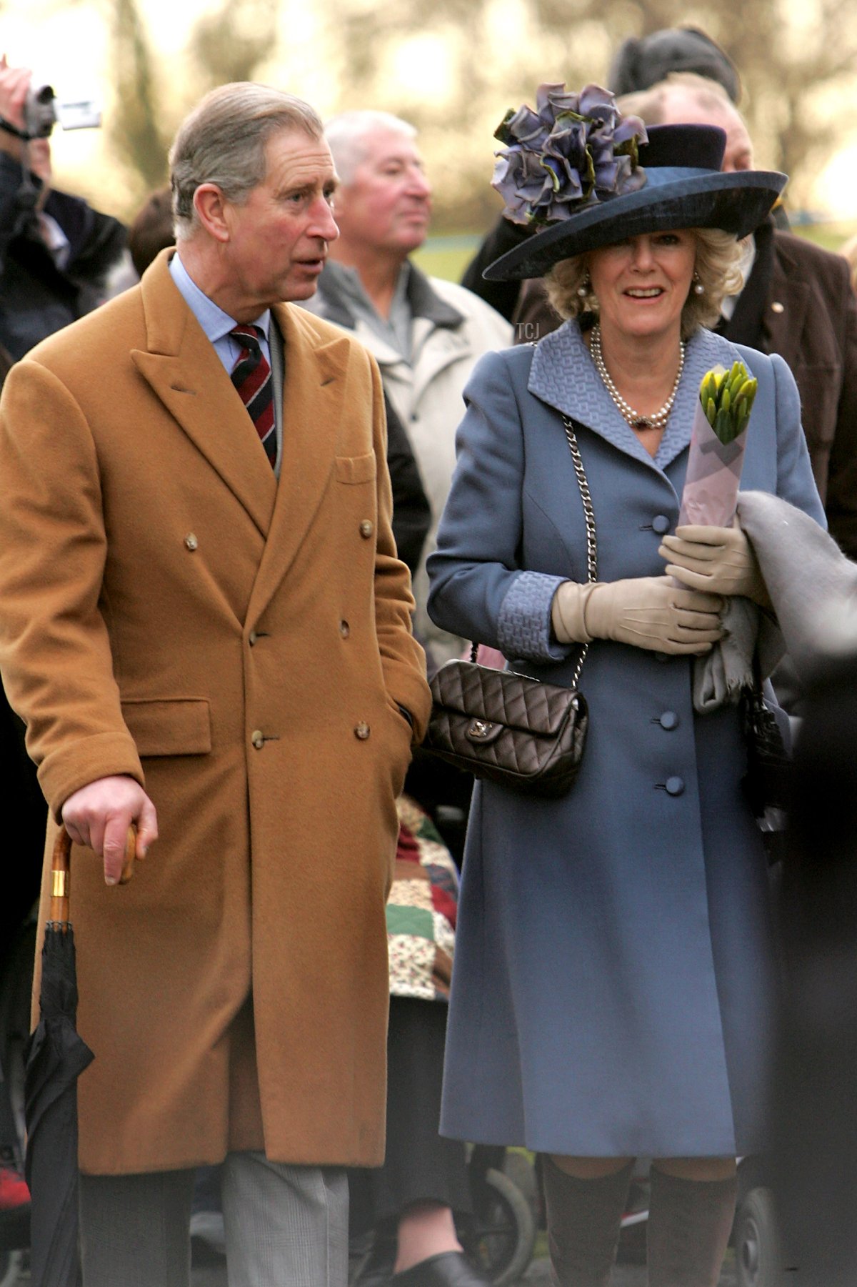 Prince Charles, Prince of Wales and Camilla, Duchess of Cornwall leave the Christmas Day service at Sandringham Church on December 25, 2005 in King's Lynn, England